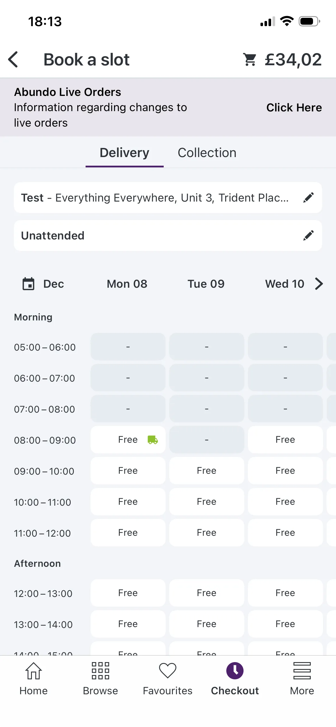 The app’s Book a slot screen: the delivery address (Test), the delivery type set to Unattended, and a week of free morning and afternoon slots